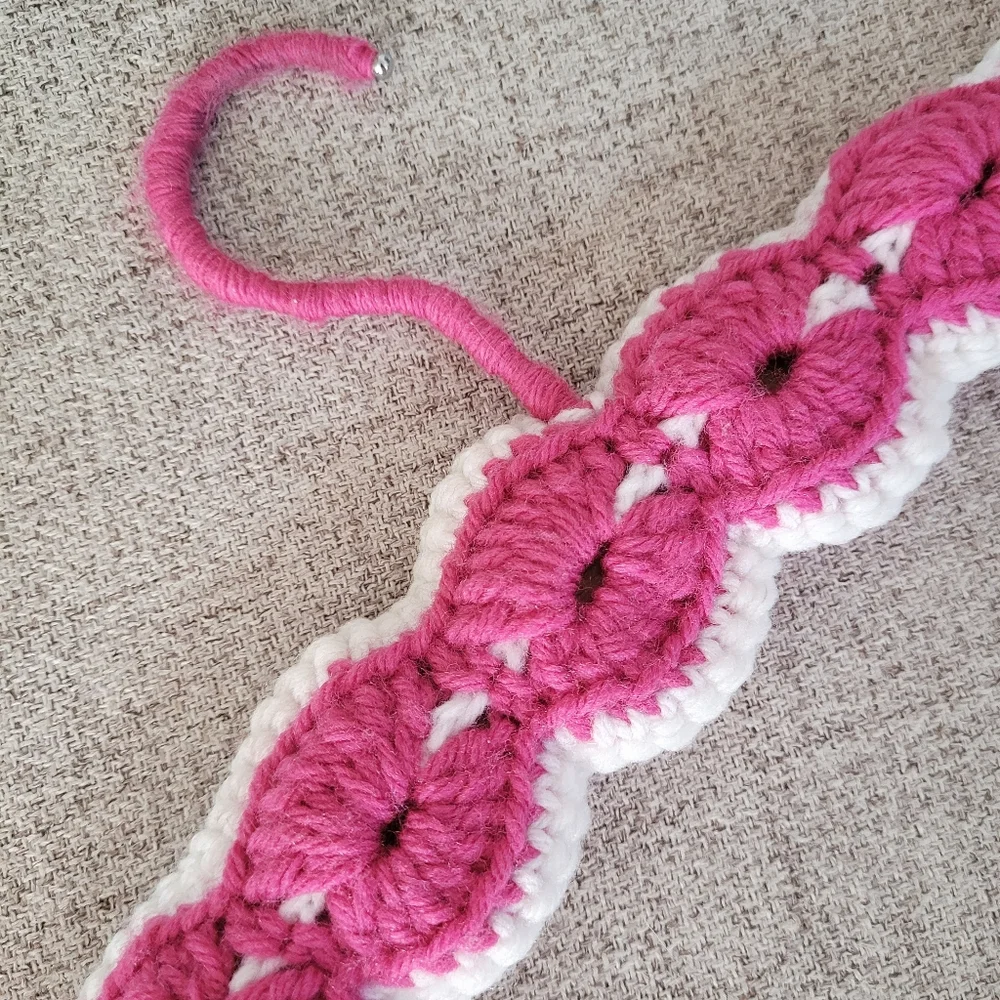 Vintage handmade knit clothing hanger